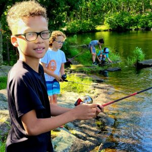 Cub Scouts fishing at Camp Yaw Paw